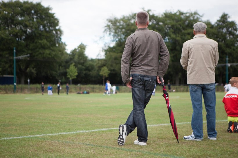 Dads watching the Storrington Swans play Football